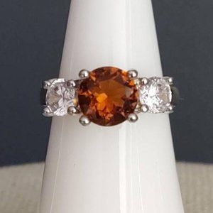 3 stone cognac and clear stone ring